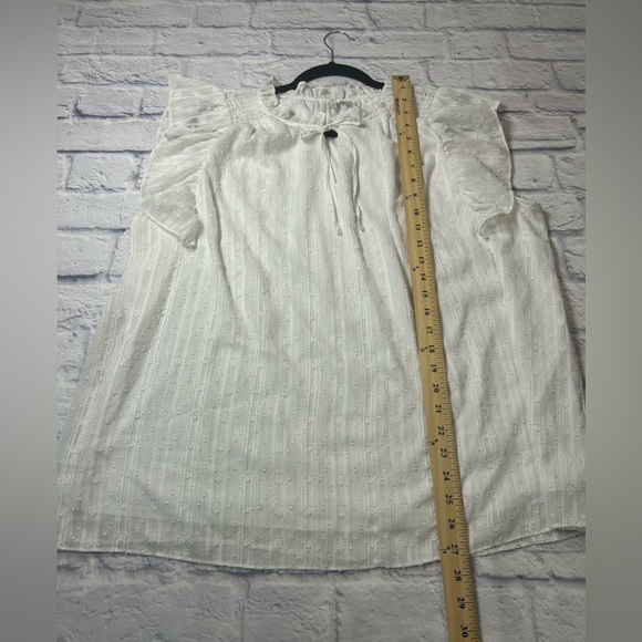 White Ruffle Sleeveless Blouse with Tie Neck. - Picture 6 of 8